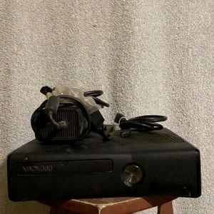 Xbox 360 with power cord and HDMI cable